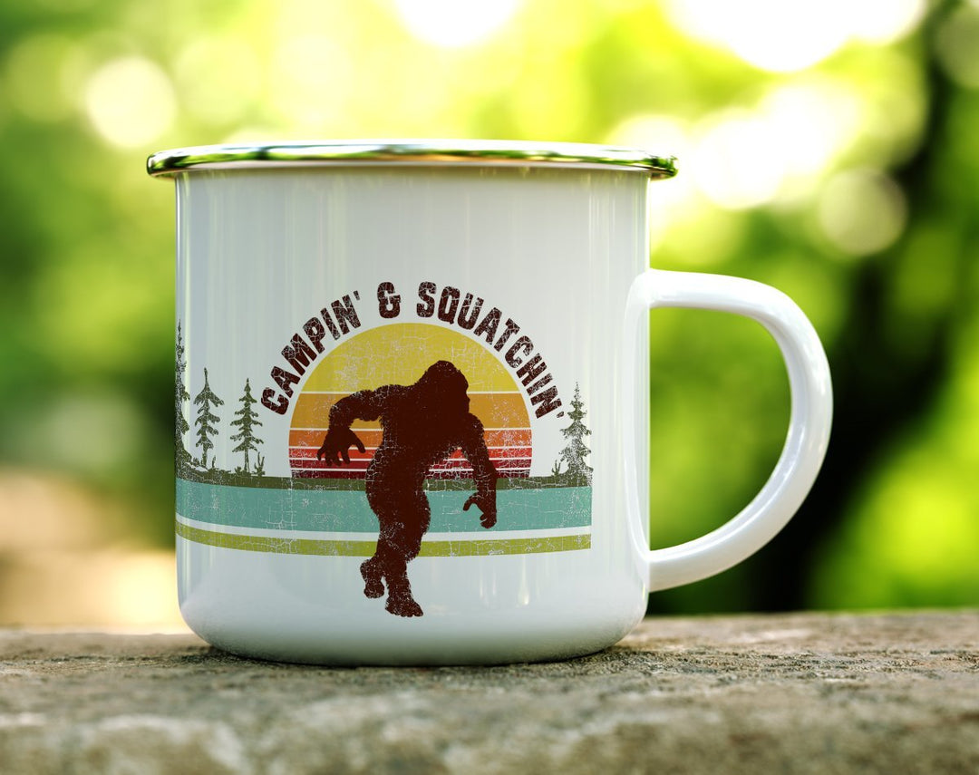 Campin' & Squatchin Camp Mug on a log